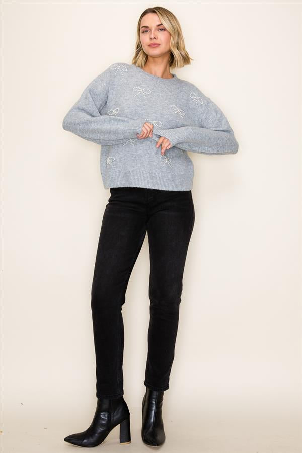 PEARL BOW SWEATER